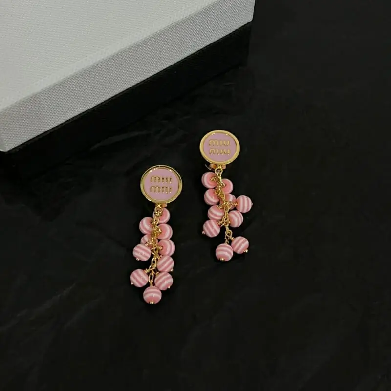 miu miu boucles doreilles pour femme s_1224051